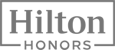 The image shows the Hilton Honors logo in a rectangular frame with the word "HONORS" beneath "Hilton."